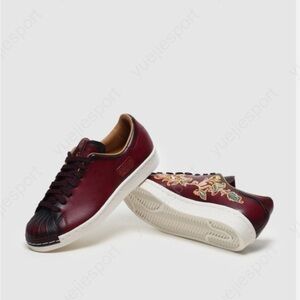 Adidas Limited Edition Maroon and Black Sneakers
